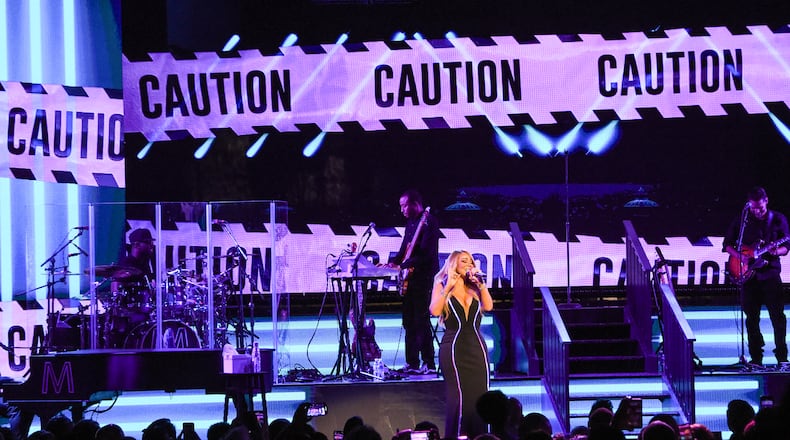 Mariah Carey performs onstage during the the Caution World Tour at Fox Theater on March 5, 2019 in Atlanta. (Photo by Kevin Mazur/Getty Images for Live Nation)