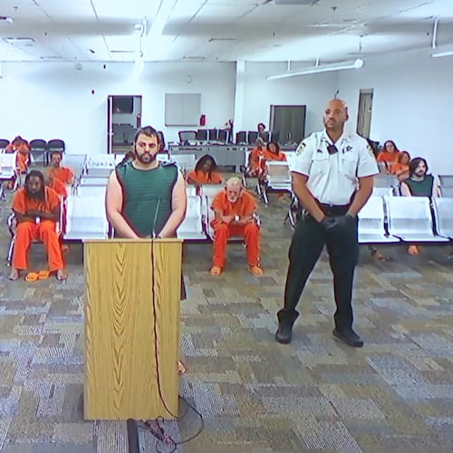 Hisham Abugharbieh, facing two counts of first-degree murder appears in court via video on Saturday, April 25, 2026 in Tampa, Fla. (WFTS-TV via AP)