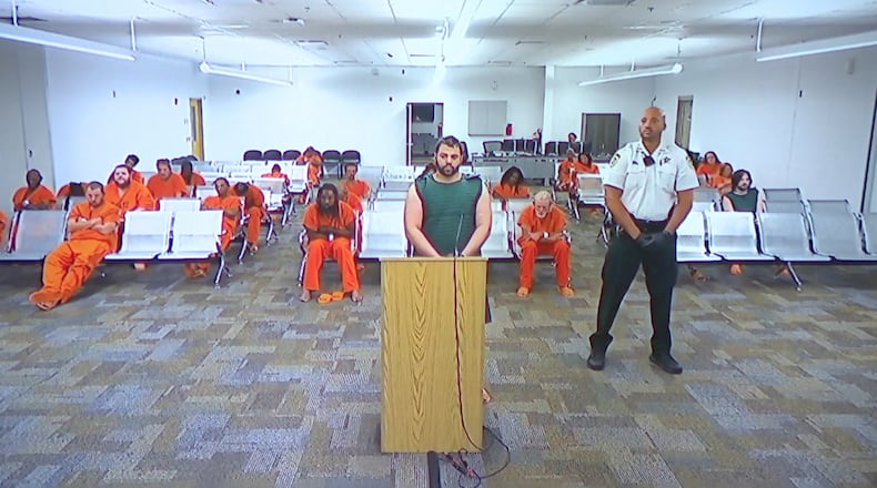 Hisham Abugharbieh, facing two counts of first-degree murder appears in court via video on Saturday, April 25, 2026 in Tampa, Fla. (WFTS-TV via AP)