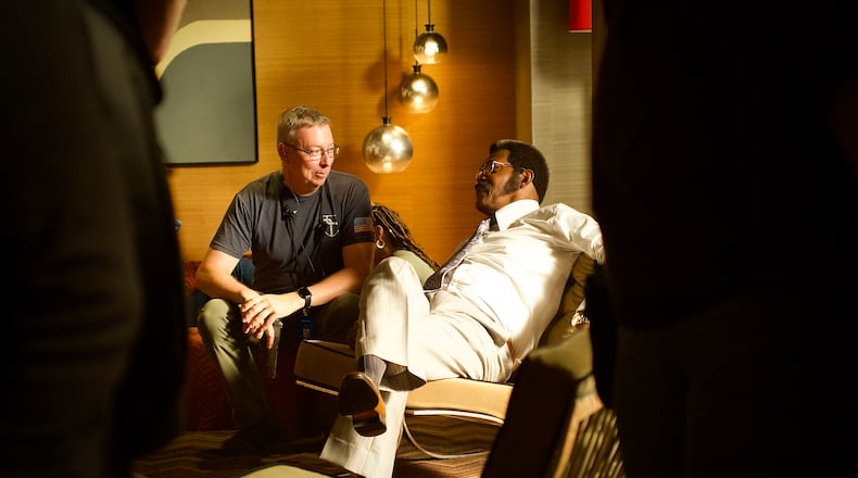 Gordon Burrows (left) is pictured with Samuel L. Jackson on the set of "Fight Night" in Atlanta. Burrows served as the on-set armorer. (Courtesy of Alan D'Antoni)