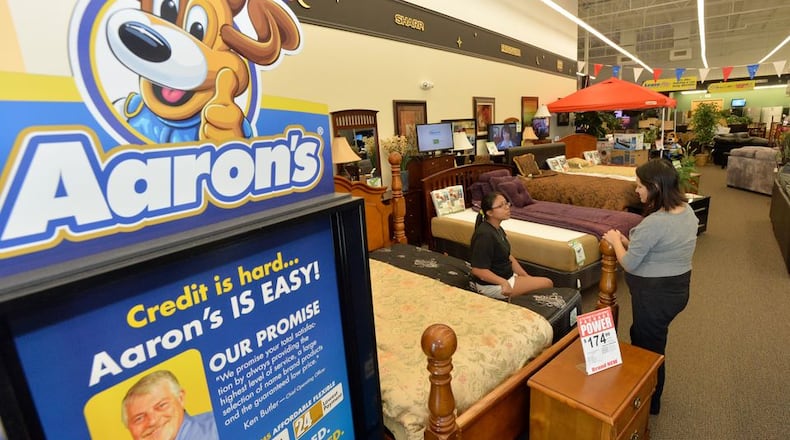 Aaron’s Inc. said its board continues to review a $2.3 billion buyout offer and has retained Goldman, Sachs & Co. as an additional adviser.
