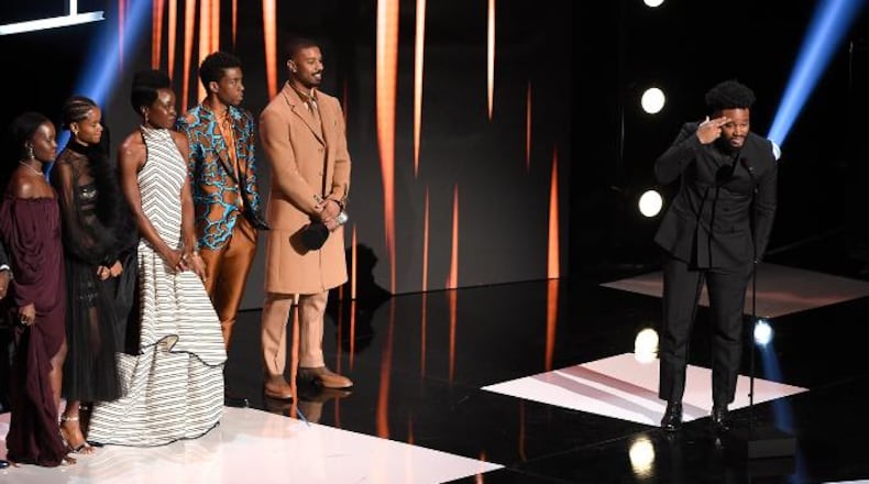 Ryan Coogler, right, and the cast of "Black Panther," accept the award for outstanding motion picture at the 50th annual NAACP Image Awards on Saturday, March 30, 2019, at the Dolby Theatre in Los Angeles.