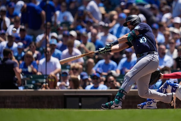 Seattle Mariners' Cal Raleigh (29) hits a home run during the first inning of a baseball game against the Chicago Cubs, Friday, June 20, 2025, in Chicago. (AP Photo/Erin Hooley)