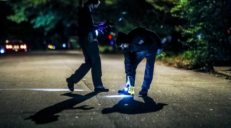 Atlanta police investigate a deadly shooting in southeast Atlanta shortly after midnight April 13.