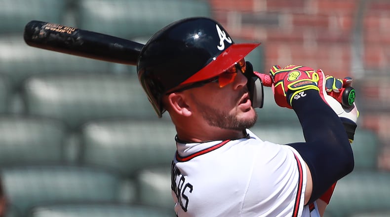 Braves' Tyler Flowers hits a solo home run for a 7-3 lead over the St. Louis Cardinals during the 8th inning. Curtis Compton/ccompton@ajc.com