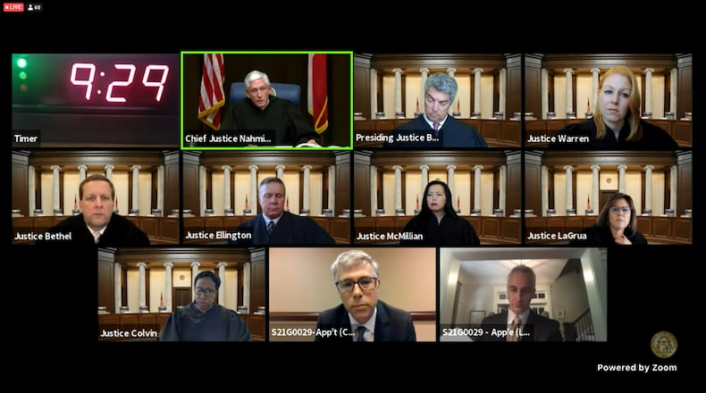 The Georgia Supreme Court on Wednesday heard arguments via Zoom as to whether property owners can boot unauthorized cars on their parking lots. Top row from left: Chief Justice David Nahmias and Justices Michael Boggs and Sarah Hawkins Warren. Middle row from left: Justices Charles Bethel, John Ellington, Carla Wong McMillian and Shawn Ellen LaGrua. Bottom row from left: Justice Verda Colvin and lawyers David Conley and Frank Lowery. (Pete Corson/peter.corson@ajc.com)