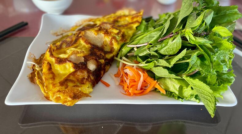 Bánh xèo, featured on the menu at Nam Phuong Buford Highway, is a popular Vietnamese street food. Angela Hansberger for The Atlanta Journal-Constitution