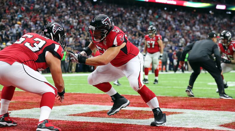 Atlanta Falcons center Ben Garland (63) and Atlanta Falcons center Alex Mack (51) warm up before the Falcons meet the New England Patriots in Super Bowl LI at NRG Stadium in Houston, Sunday, Feb. 5, 2017.