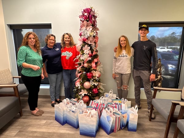 Sabrina Bridwell (second from right) and her son, Jake, made gift bags for newly diagnosed cancer patients last year. (Courtesy of Sabrina Bridwell)