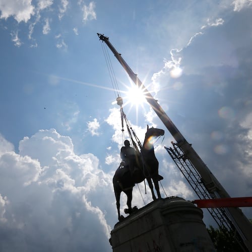 FLE - A crew removes the statue of Confederate Gen. Stonewall Jackson, July 1, 2020, in Richmond, Va. (AP Photo/Steve Helber, File)