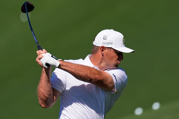Bryson DeChambeau hits from the Masters driving range earlier this week.
