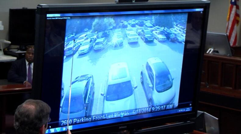 Jurors are shown security footage of Justin Ross Harris' car on the day that Cooper died, during during Harris' murder trial at the Glynn County Courthouse in Brunswick, Ga., on Tuesday, Oct. 18, 2016. (screen capture via WSB-TV)