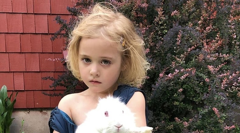 Mary Dean shared this photo of her granddaughter Juniper Dean cuddling Peta, her rabbit rag doll.