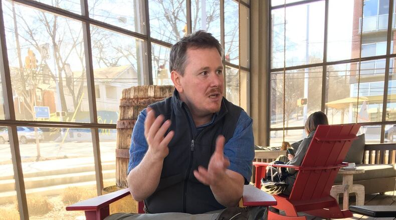 In town to evaluate the ongoing construction of City Winery Atlanta, chief winemaker David Lecomte, explains the complexities of building a winery/restaurant/concert venue in Ponce City Market. The project is due to open on May 2. Photo Credit: Jessica Milde