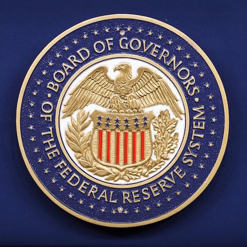 The logo of the Federal Reserve Board of Governors is seen before a news conference with Federal Reserve Board Chairman Kevin Warsh at the Federal Reserve in Washington, Wednesday, July 29, 2026. (AP Photo/Mark Schiefelbein)