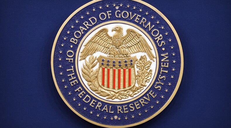 The logo of the Federal Reserve Board of Governors is seen before a news conference with Federal Reserve Board Chairman Kevin Warsh at the Federal Reserve in Washington, Wednesday, July 29, 2026. (AP Photo/Mark Schiefelbein)