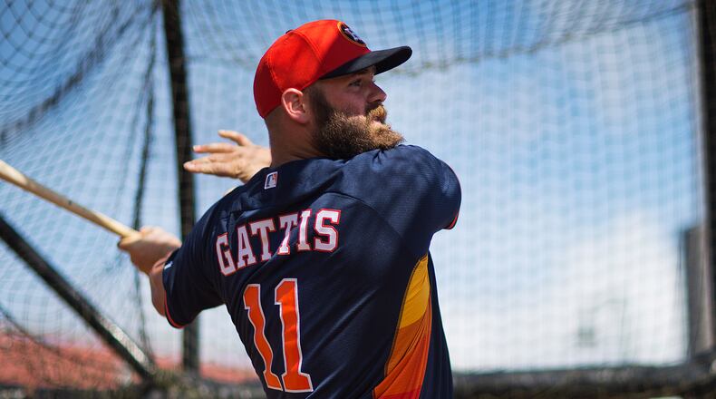 Houston Astros' Evan Gattis takes batting practice during a spring training baseball workout, Tuesday, March 3, 2015, in Kissimmee, Fla. (AP Photo/David Goldman)
