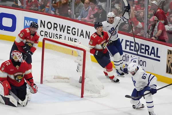Toronto Maple Leafs left wing Max Pacioretty (67) reacts after scoring a goal against Florida Panthers goaltender Sergei Bobrovsky (72) during the third period in Game 6 of a second-round NHL hockey playoff series, Friday, May 16, 2025, in Sunrise, Fla. (AP Photo/Lynne Sladky)