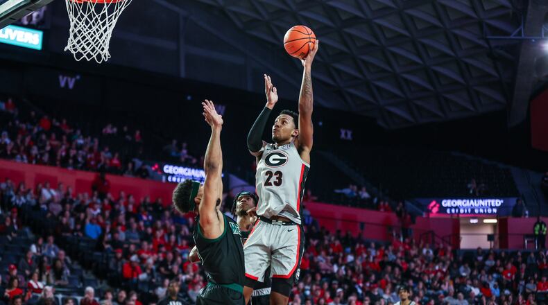 Georgia's Braelen Bridges puts up a shot against George Mason at Stegeman Coliseum in Athens, Ga., on Saturday, Dec. 18, 2021. (Photo by Tony Walsh / UGA Athletics)