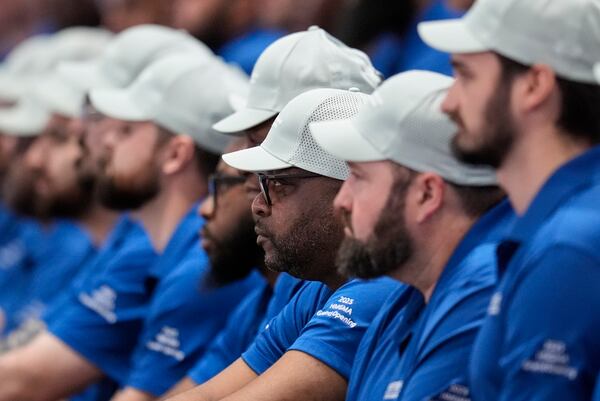 Employees listen during a media tour at the Hyundai Motor Group Metaplant America, Wednesday, March 26, 2025, in Ellabell, Ga. (AP Photo/Mike Stewart)