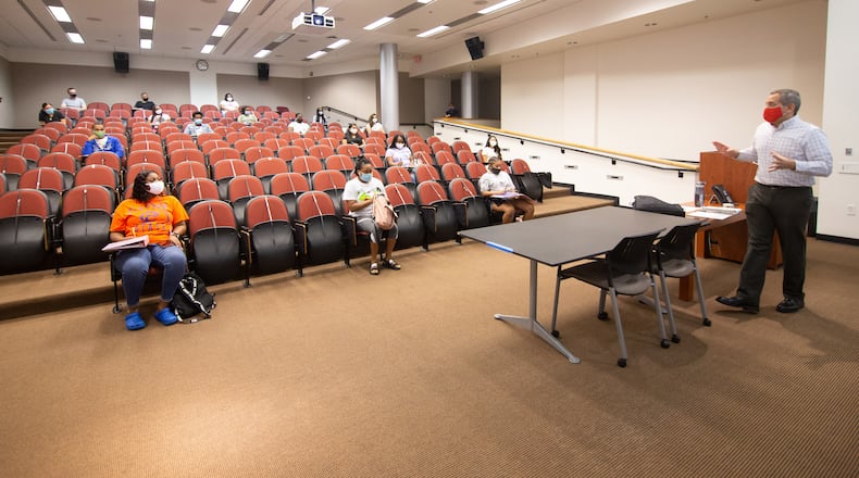 Students listen to their chemistry teacher at Clayton State University on the first day students returned to school Monday, Aug. 10, 2020.  STEVE SCHAEFER FOR THE ATLANTA JOURNAL-CONSTITUTION