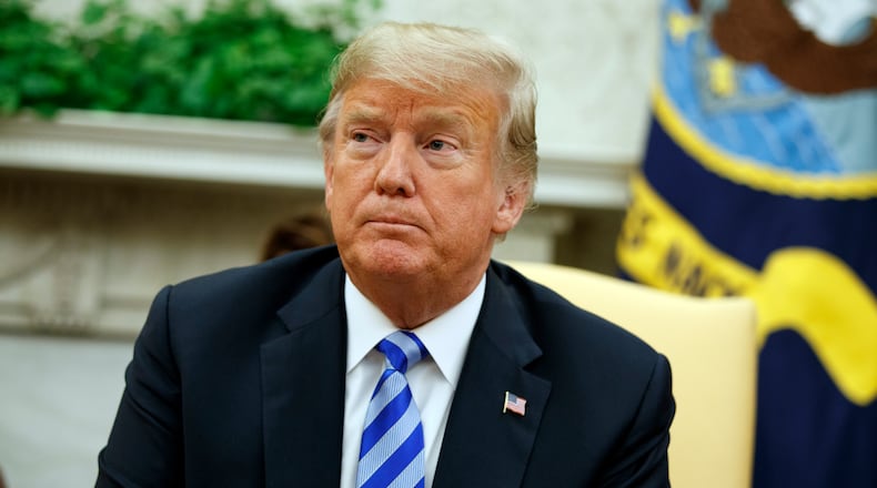 President Donald Trump listens during a meeting with Sheikh Sabah Al Ahmad Al Sabah, the emir of Kuwait, in the Oval Office of the White House on Wednesday. AP/Evan Vucci