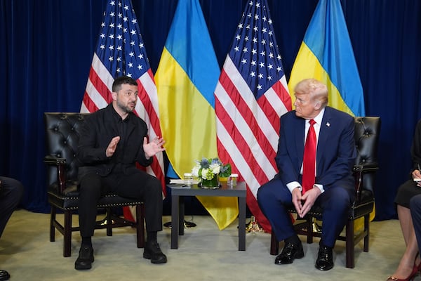 President Donald Trump (right) and Ukrainian President Volodymyr Zelenskyy meet during the U.N. General Assembly in September. (Evan Vucci/AP)