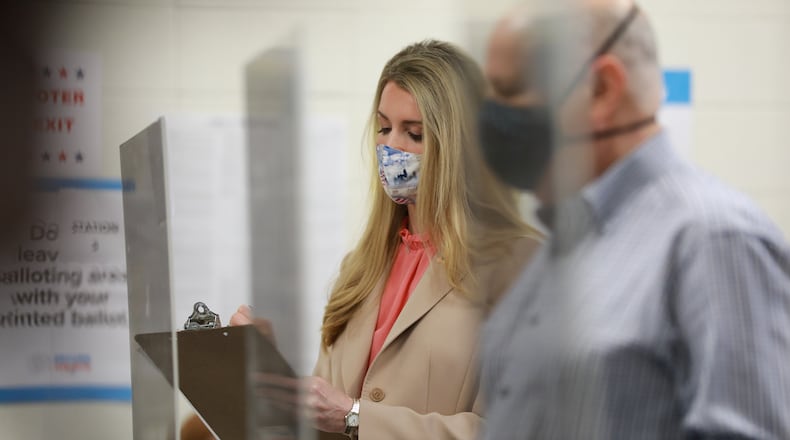 ATLANTA, GA - OCTOBER 13: U.S. Sen. Kelly Loeffler (R-GA) prepares to cast her vote during early voting in Atlanta on October 13, 2020 in Atlanta, Georgia. Loeffler, who was appointed in 2019 by Governor Brian Kemp to succeed former Senator Johnny Isakson, is on the ballot in a special election with 21 candidates from all parties, including U.S. Rep. Doug Collins. (Photo by Lynsey Weatherspoon/Getty Images)