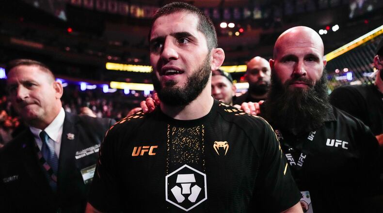FILE - Russia's Islam Makhachev leaves a welterweight title bout after defeating Australia's Jack Della Maddalena at the UFC 322 mixed martial arts event, Saturday, Nov. 15, 2025, in New York. (AP Photo/Yuki Iwamura, file)