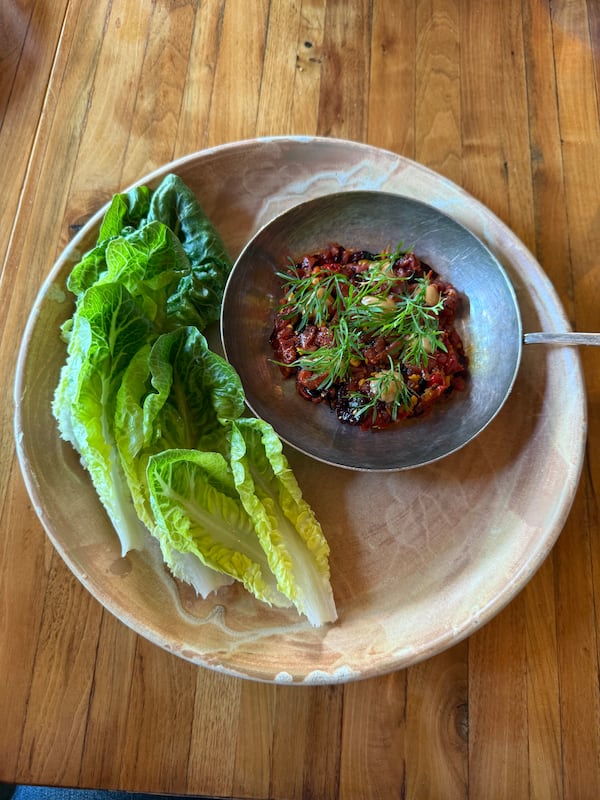 Served with lettuce instead of toast points, the Beef Tartare at Staplehouse is a taste exposion. (Angela Hansberger for the AJC)