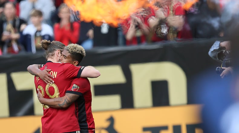MARCH 18, 2017 Atlanta, Josef Martinez on fire, he gets a hug fom his team mate after scoring the fourth goal of the Atlanta United, he was name the player of the game.