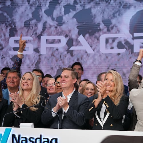 Gwynne Shotwell, President and COO of SpaceX celebrates with colleagues during a bell ringing ceremony for the IPO of SpaceX at the Nasdaq MarketSite in New York, Friday, June 12, 2026, in New York. (AP Photo/Frank Franklin II)