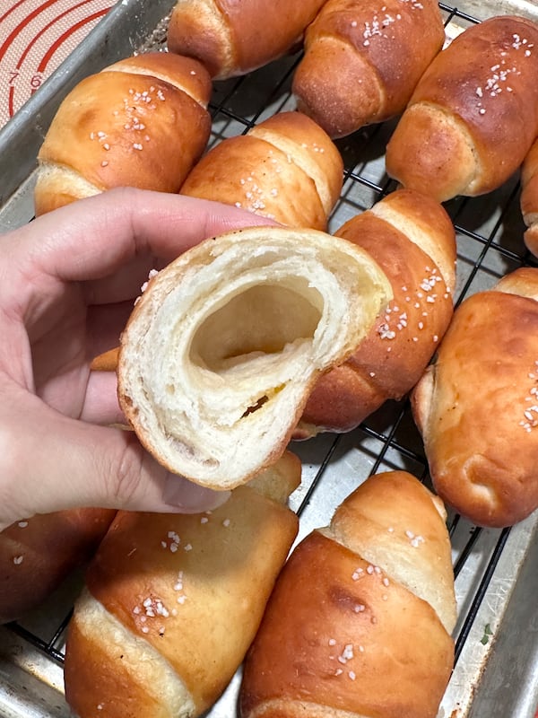 All salt bread has a butter hole, a cavity left behind in the baking process after a triangular strip of dough is wrapped around a piece of butter. (Courtesy of Lydia Huh)