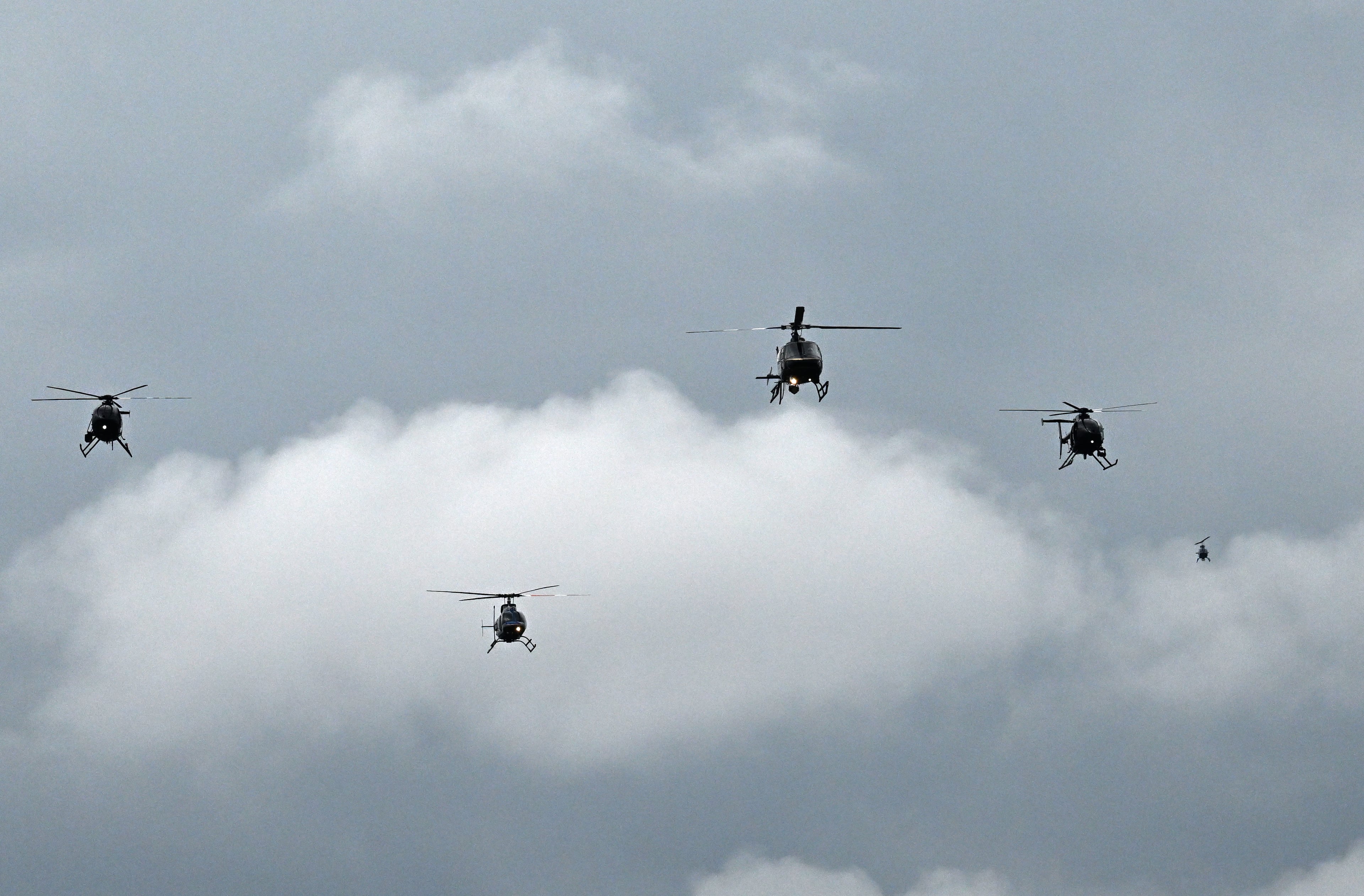 A flyover takes place following the memorial service for DeKalb County police Officer David Rose, who was killed while responding to the Aug. 8 shooting at the CDC, outside the First Baptist Church Atlanta, Friday, August 22, 2025, in Atlanta. Hyosub Shin / AJC)