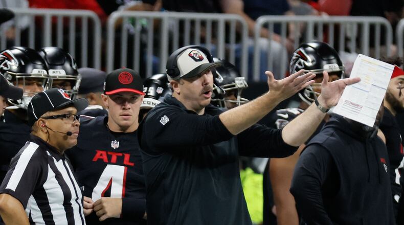 Falcons coach Arthur Smith argues with a referee during the second half of an NFL football game against the Tampa Bay Buccaneers on Sunday, Dec. 10, 2023, at Mercedes-Benz Stadium in Atlanta. (Miguel Martinez/miguel.martinezjimenez@ajc.com)