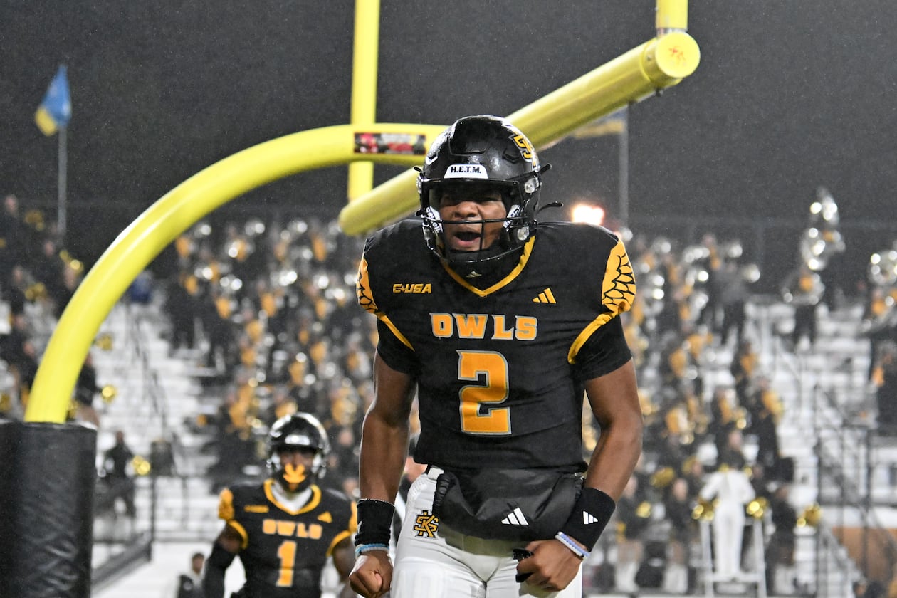 Kennesaw State quarterback Amari Odom set school single-game records for passing yards, total offense and passing touchdowns in a 41-34 Owls win over Missouri State. (Hyosub Shin/AJC)