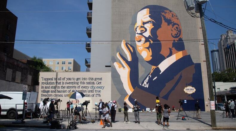 Congressman John Lewis, who died one year ago this month, contributed to two posthumous books published this summer.
AJC File