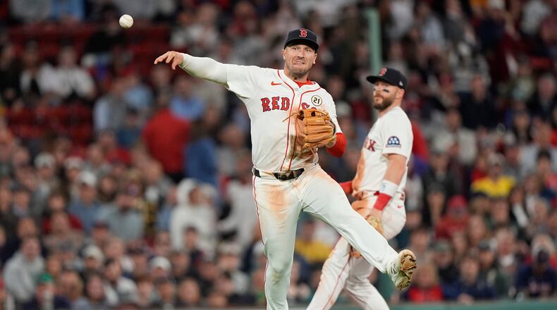 FILE - Boston Red Sox third baseman Alex Bregman throws late to first on a single by Athletics Jacob Wilson in the sixth inning of a baseball game, Sept. 16, 2025, in Boston. (AP Photo/Robert F. Bukaty, File)