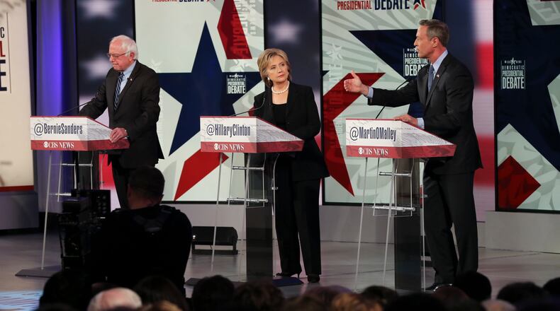 From right: Martin O'Malley, Hillary Rodham Clinton and Sen. Bernie Sanders take part in the Democratic presidential debate at Drake University in Des Moines, Iowa, Nov. 14, 2015. (Ruth Fremson/The New York Times)