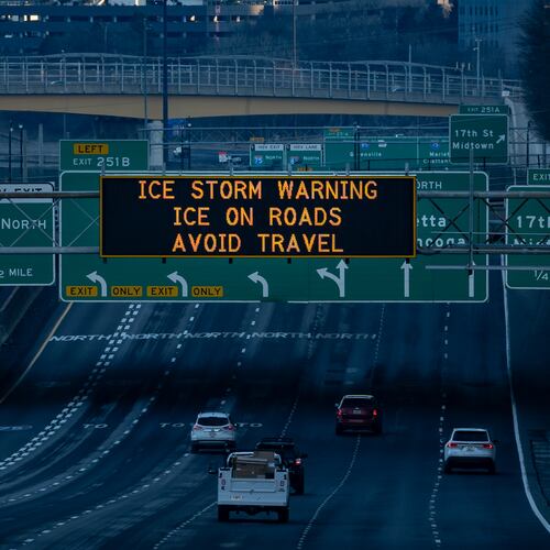 A Georgia Department of Transportation sign warns drivers of ice on roads during an ice storm warning in Atlanta, Georgia, Monday, Jan 26, 2026 (Ben Hendren for the AJC)