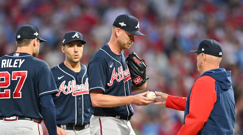 Atlanta Braves starting pitcher Bryce Elder is relieved by manager Brian Snitker during the fourth inning of NLDS Game 3 against the Philadelphia Phillies in Philadelphia on Wednesday, Oct. 11, 2023.   (Hyosub Shin / Hyosub.Shin@ajc.com)