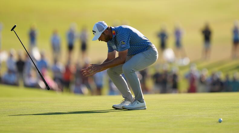 Sam Burns celebrates after a birdie on the 16th hole during the final round of the U.S. Open golf tournament at Shinnecock Hills Golf Club in Southampton, N.Y., Sunday, June 21, 2026. (AP Photo/David J. Phillip)