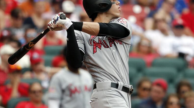 Christian Yelich has drawn interest from multiple teams including the Braves, who could improve their defense and lineup significantly by trading for the Marlins outfielder. (AP Photo/Jeff Roberson)