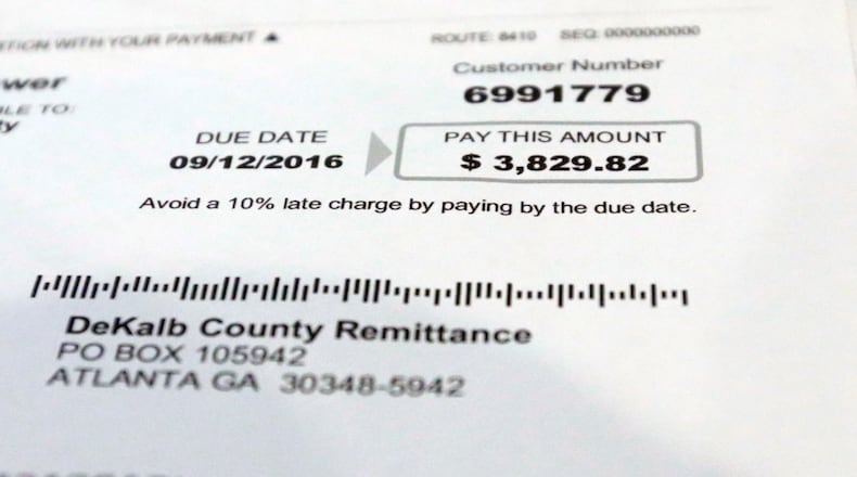Many DeKalb County residents say they’re receiving water and sewer bills that are too high. DeKalb County recently created a customer service team to handle billing disputes. BOB ANDRES /BANDRES@AJC.COM