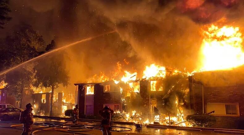 Five people were taken to the hospital and dozens of residents were displaced by the massive fire.