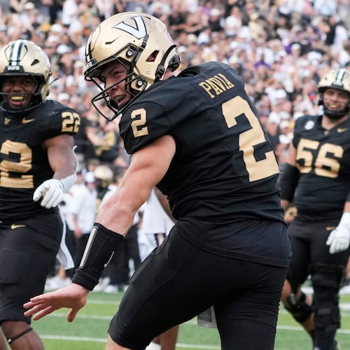 Vanderbilt quarterback Diego Pavia (2) celebrates his touchdown during the second half of an NCAA college football game against LSU, Saturday, Oct. 18, 2025, in Nashville, Tenn. (AP Photo/George Walker IV)