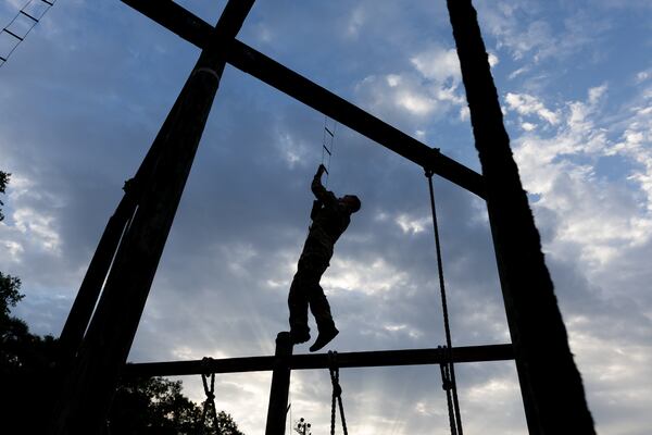 Maj. Jack Gibson completes obstacle course training at Fort Moore in Columbus. His late grandfather, Jim Shalala, volunteered for the 2nd Ranger Battalion, an elite Army unit that was organized at Camp Forrest near Tullahoma, Tennessee. (Arvin Temkar / AJC)