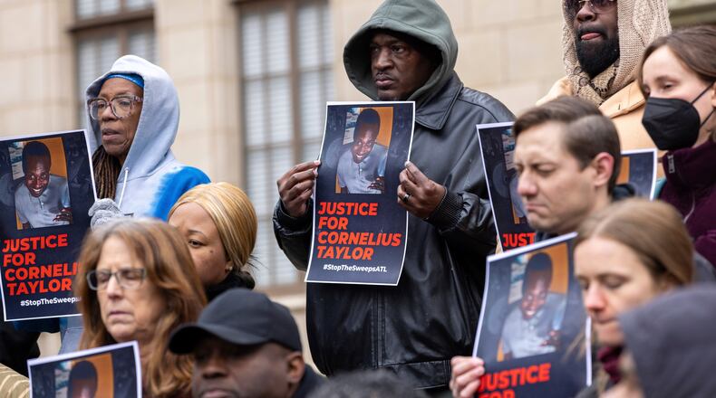 FILE - Family members and activists protest the death of Cornelius Taylor, an unhoused man killed when the city cleared an encampment last week, in front of City Hall in Atlanta, Jan. 23, 2025. (Arvin Temkar/Atlanta Journal-Constitution via AP, File)