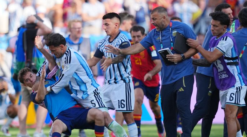 FILE - Argentina's Leandro Paredes (5) knocks down Spain's Gavi (9) during scuffle after the World Cup final soccer match between Spain and Argentina in East Rutherford, N.J., near New York, Sunday, July 19, 2026. (AP Photo/Julio Cortez, File)