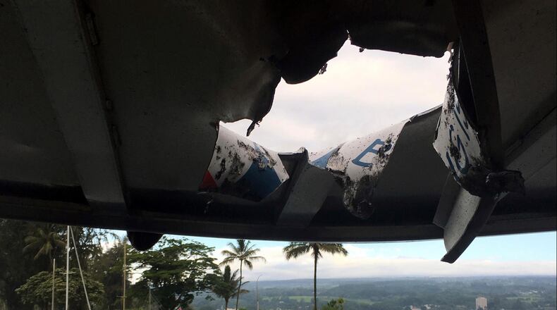 This photo provided by the Hawaii Department of Land and Natural Resources shows damage to the roof of a tour boat after an explosion sent lava flying through the roof off the Big Island of Hawaii Monday, July 16, 2018, injuring at least 23 people. The lava came from the Kilauea volcano, which has been erupting from a rural residential area since early May.
